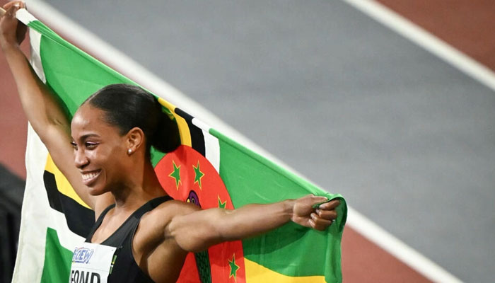 Triple jumper Thea Lafond celebrates after winning the womens triple jump final on March 3, 2024. — AFP