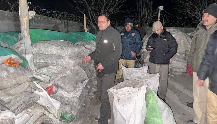 Minerals Department staff, along with a magistrate and police, recovered 65 tons of mica from the residence of a Chinese national, residing in Skardu city. — Facebook/Directorate Mine& minerals Baltistan Region