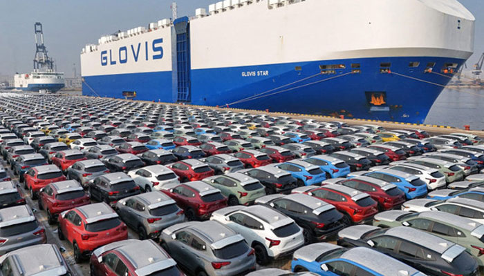 This file photo taken on January 2, 2024, shows cars waiting to be loaded onto a ship for export at the port in Yantai, in Chinas eastern Shandong province. — AFP