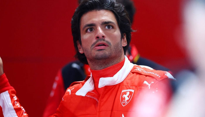 Ferrari driver Carlos Sainz looks up in this photo. — AFP/File