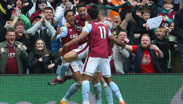 Aston Villa striker Ollie Watkins celebrates with teammates. — AFP/File