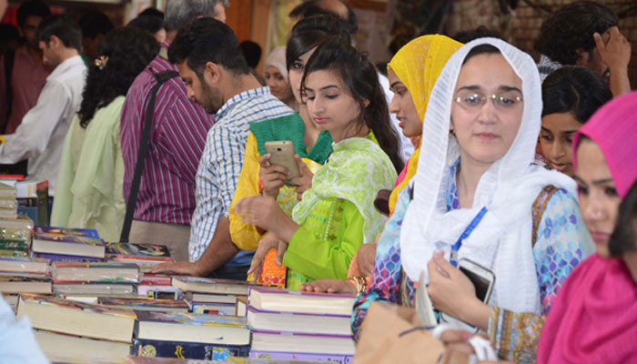 Students visit book stall at Pakistans largest annual book fair organised by PU administration. — PU website/File