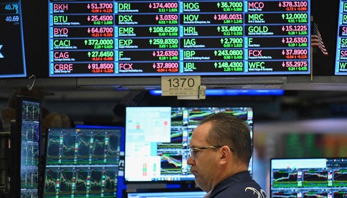 trader on the floor of the New York Stock Exchange in New York City, USA on March 4, 2024. — AFP