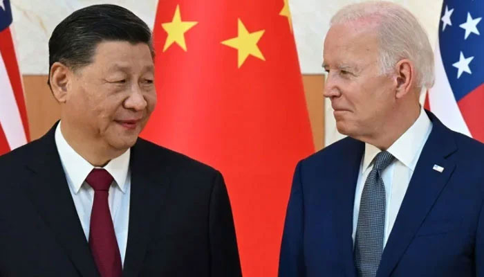 Chinas President Xi Jinping (L) and US President Joe Biden. — AFP/File