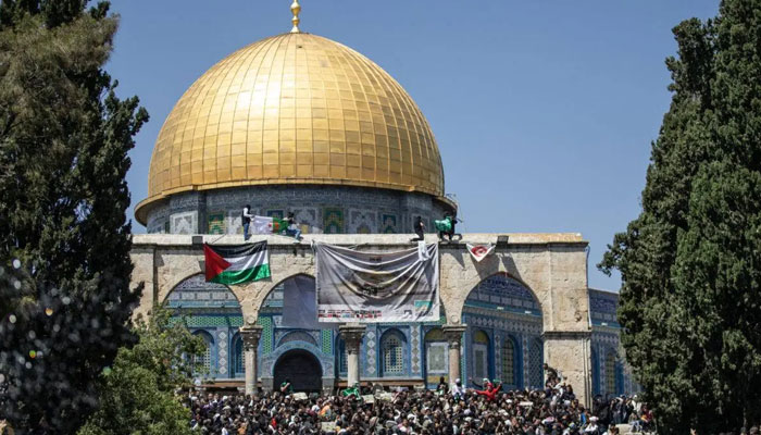 Muslims mark the Al-Quds Day (Jerusalem) as they gather to perform the 4th Friday Prayer of holy Islamic month of Ramadan at Al-Aqsa Mosque in Jerusalem on April 14, 2023. — Anadolu Agency