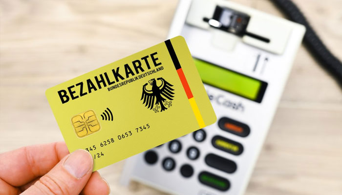 Germany: Cash card for asylum seekers, February 27, 2024.— Chromorange/File