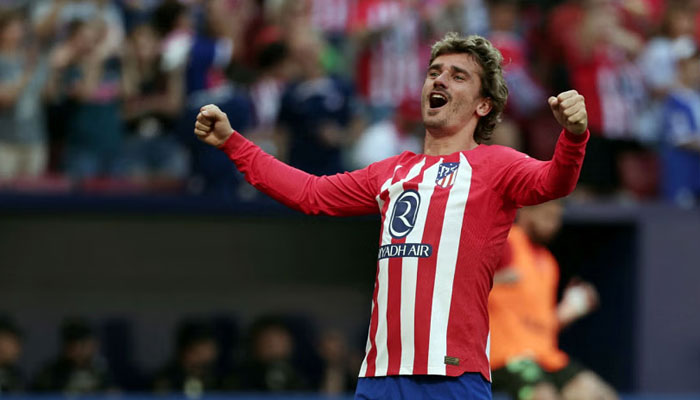 Atletico Madrids Antoine Griezmann celebrates during the Spanish league football match against Girona FC at the Metropolitano stadium in Madrid on April 13, 2024. — AFP