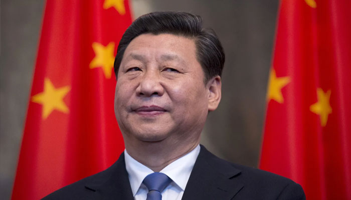 Chinese President Xi Jinping poses for a photo in Berlin during his visit to Germany. — AFP/File