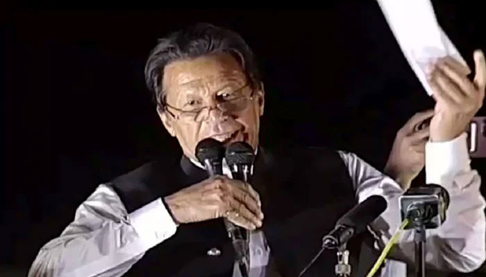 The screenshot shows former prime minister Imran Khan brandishing a letter during a rally in Parade Ground, Islamabad, on March 27, 2023. — YouTube/GeoNews