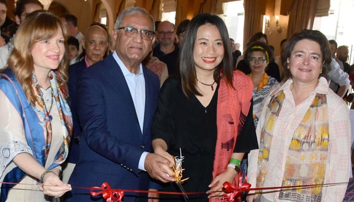 Aziz Boolani, CEO of Serena Hotels cut a ribbon along with Islamabad Foreign Women’s Association (IFWA) officials during the International Food Festival “Taste the World” on May 5, 2024. — Facebook/Serena Hotels