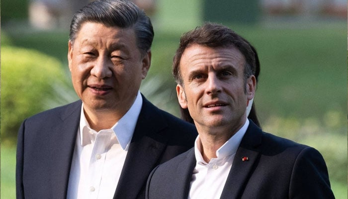 Chinese President Xi Jinping pictured alongside French President Emmanuel Macron. — AFP/File