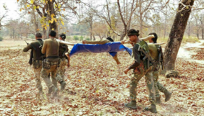 Security force personnel carry the body of their colleague after an attack by Maoist fighters in Bijapur in the central state of Chhattisgarh, India, April 4, 2021. — Reuters