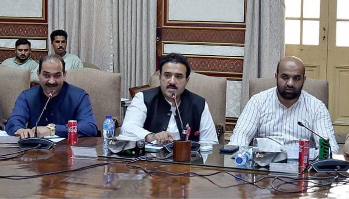 Local Government Minister Zeeshan Rafique (C) presides over a meeting along with Education Minister Rana Sikandar Hayat (R) on May 11, 2024. — Facebook/Mian Zeeshan Rafique PMLN