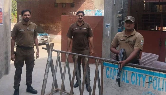 Punjab police personnel stand guard in the city on October 3, 2023. — Facebook/DIG Ops Lahore Police