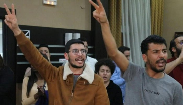 Tunisian lawyers chant slogans during a protest at the bar association headquarters in Tunis. — AFP/File