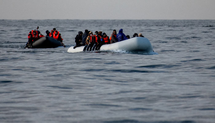 Two inflatable dinghies carrying migrants make their way towards England in the English Channel, Britain, May 4, 2024. — Reuters