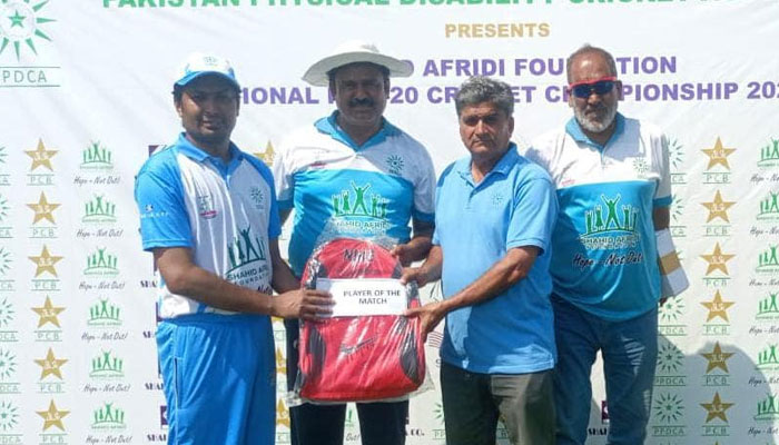 Officials awarding player of the match to a player at the post-match ceremony during the SAF Disability T20 Cricket Championship on May 14, 2024. — Facebook/Pakistan Physical Disability Cricket Association