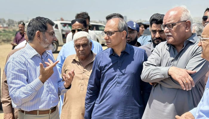 Sindh Local Government Minister Saeed Ghani is being briefed on the under-construction Malir Expressway project on May 15, 2024. — Facebook/Saeed Ghani