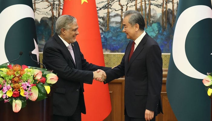 FM and Deputy PM Ishaq Dar interacts with Chinese FM Wang Yi in Beijing, China on May 15, 2024. —X/@ForeignOfficePk