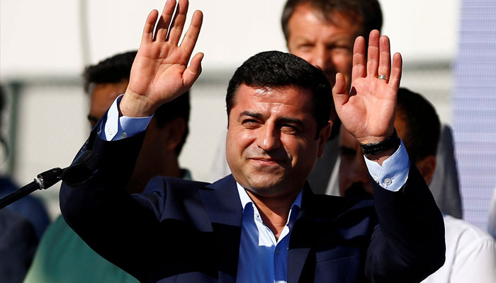 Selahattin Demirtas, co-leader of the pro-Kurdish Peoples Democratic Party (HDP), greets the crowd during a peace rally to protest against Turkish military operations in northern Syria, in Istanbul, Turkey, September 4, 2016. — Reuters