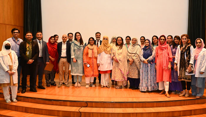 Participants pose for a group photo during a seminar held at the Sindh Institute of Urology and Transplantation (SIUT) in relation to World Hypertension Day on May 18, 2024. — Facebook/SIUT