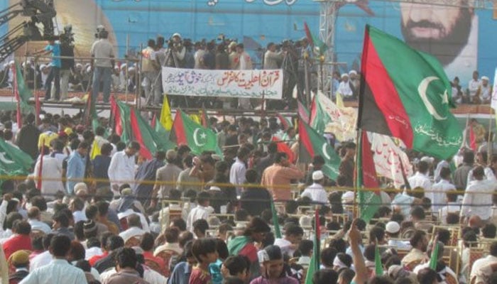 Supporters of Majlis-e-Wahdat-e-Muslimeen (MWM) hold flags during a Public gathering. — Facebook/Majlis E Wahdat E Muslimeen Unit Naudero/File/File