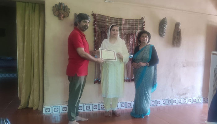 Sitara Ayaz, former Senator from Awami National Party (ANP) distributes the Certificate during three ۔ days of residential training on workplace harassment law At Mehergarh Training Center Islamabad on May 19, 2024. — Facebook/Senator Sitara Ayaz