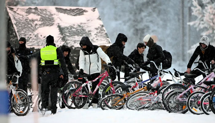 Migrants seen on the Finnish border in this undated photo.— Reuters/file
