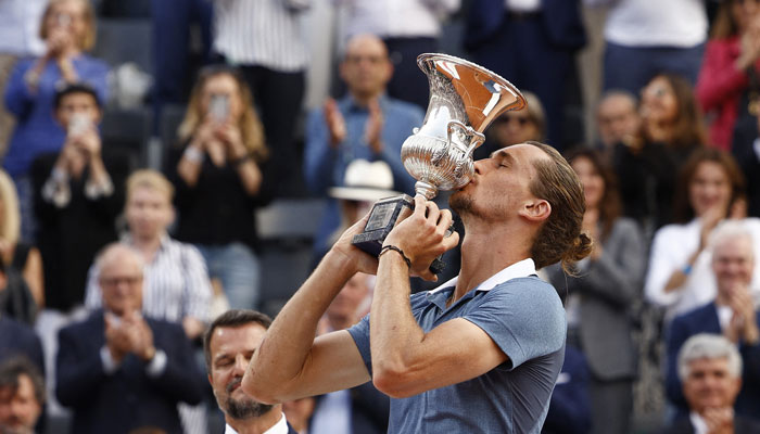 Germanys Alexander Zverev celebrates with the trophy after winning his final match against Chiles Nicolas Jarry. — Reuters/file