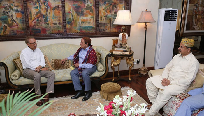 Senior PTI leader and lawyer Sardar Latif Khan Khosa exchange views with former president Dr Arif Alvi at the residence of Sindh PTI President Haleem Adil Sheikh on May 20, 2024. — Facebook/Haleem Adil Sheikh