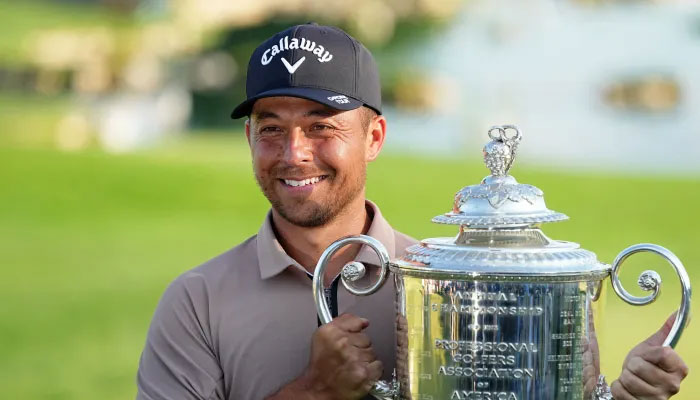 Xander Schauffele holds The Wanamaker Trophy after winning the PGA Championship on May 20, 2024. — USA Today Sports