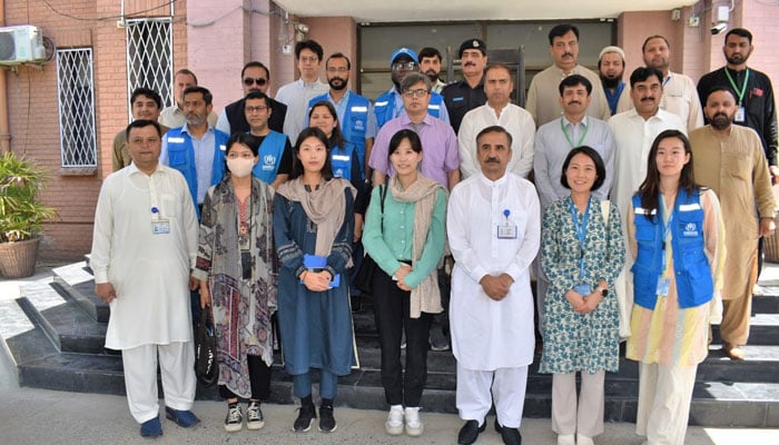 UNHCR, Embassy of Republic of Korea Islamabad and KOICA delegates pose for a group photo during visits to MTI MMC on May 22, 2024. — Facebook/MTI Mardan
