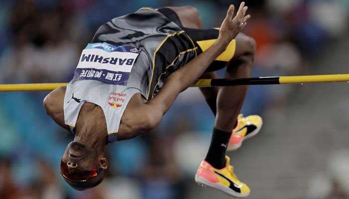 Qatars Mutaz Barshim attempts a high jump during a competition .— Reuters/File