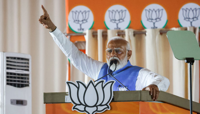 Indias Prime Minister Narendra Modi gestures as he addresses his supporters during an election campaign rally, in New Delhi, India, May 22, 2024. — Reuters