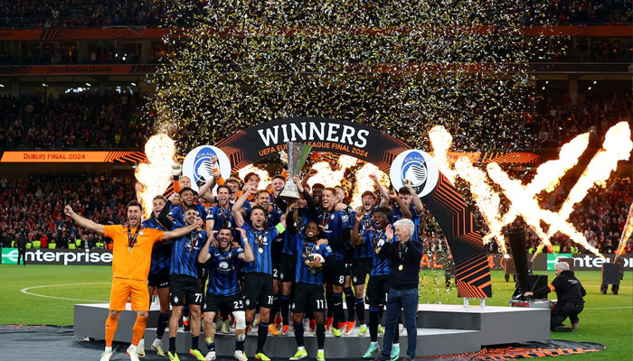 Atalantas Berat Djimsiti lifts the trophy with teammates to celebrate winning the Europa League Final .—Reuters/File