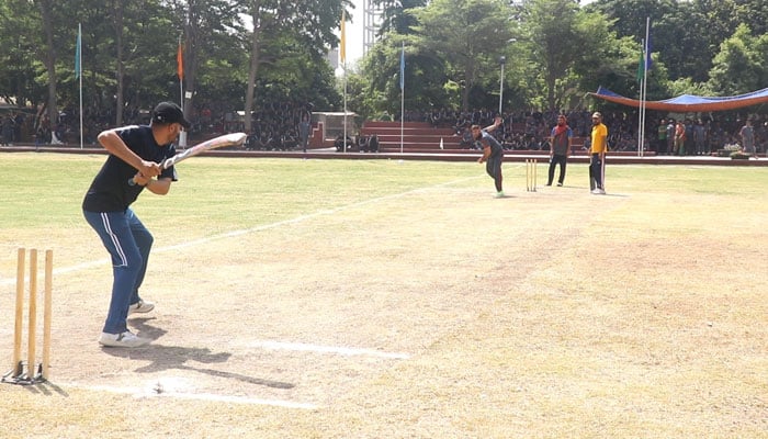 In this image, a police player plays a shot during a three-day sports gala at Police Training College Chuhng on May 23, 2024. — Facebook/Punjab Police Pakistan