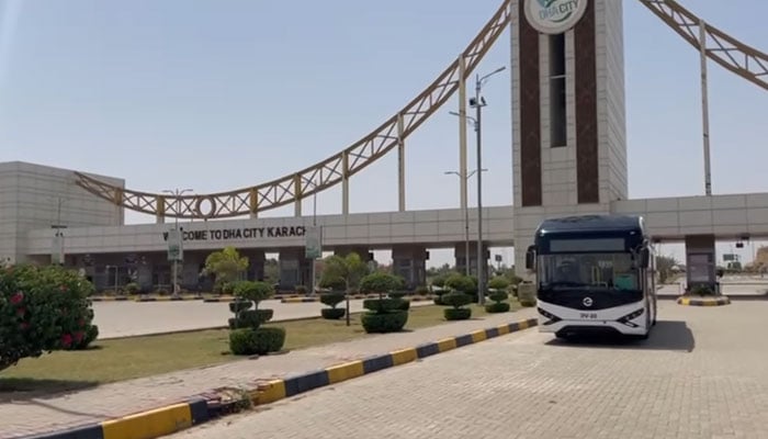 In this still, an Electric Bus (EV Bus) can be seen near the entrance of the DHA City Karachi on May 23, 2024. — Facebook/Sindh Mass Transit Authority
