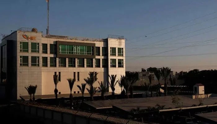 A view of the K-Electric head office, with solar panels at the parking area, in Karachi on January 24, 2023. — AFP