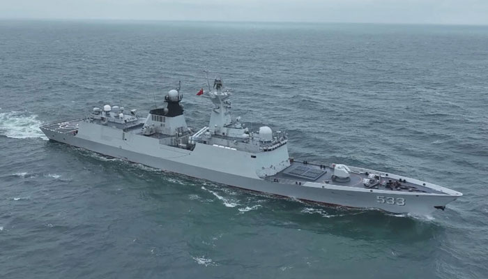 A naval vessel sailing at sea during the Joint Sword-2024A milirary drill at an unknown location, in an undated handout photograph released on May 24, 2024 by the Eastern Theater Command of Chinas Peoples Liberation Army (PLA). — AFP File