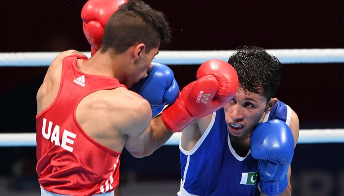 A representational image of a Pakistani boxer during a match against a UAE adversary. — PSB/File
