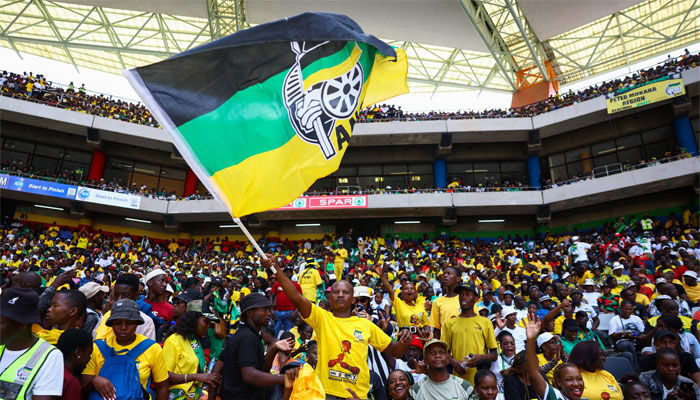 An African National Congress (ANC) supporter waves a flag during the 112th anniversary celebrations of the founding of the party, at Mbombela Stadium in Mpumalanga province, South Africa, January 13, 2024. — Reuters