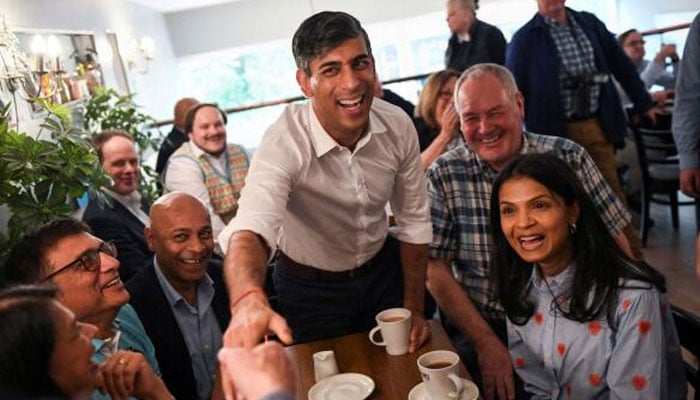British Prime Minister Rishi Sunak, his wife Akshata Murty and Bob Blackman, Conservative Member of Parliament, attend a Conservative general election campaign event in Stanmore, London. — Reuters/File