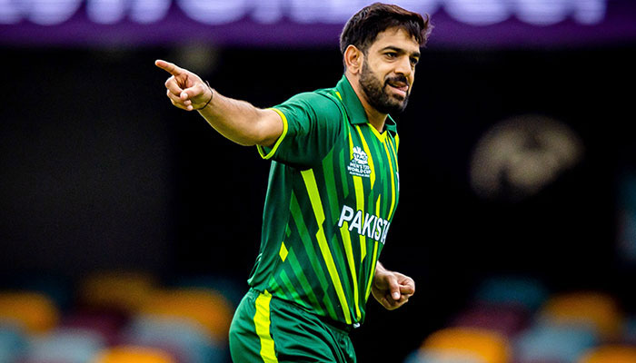 Pakistan´s Haris Rauf celebrates his wicket of Afganistan´s Azmatullah Omarzai during the ICC men´s Twenty20 World Cup 2022 cricket warm-up match between Afghanistan and Pakistan at the Gabba in Brisbane on October 19, 2022. — AFP