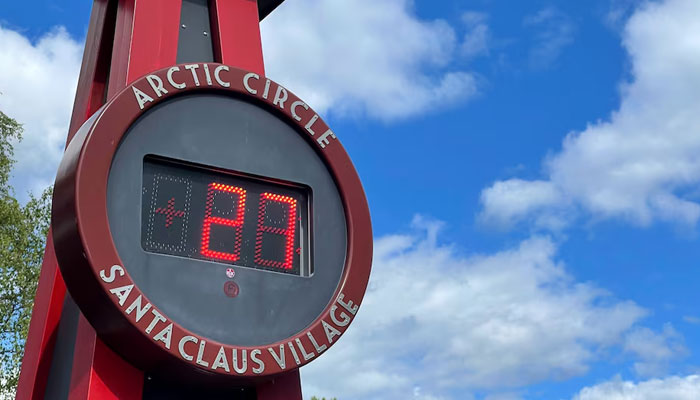 A thermometer reads 27 degrees Celsius at the main square of the Santa Claus Village in the Arctic Circle near Rovaniemi in Lapland, Finland. — Reuters/File