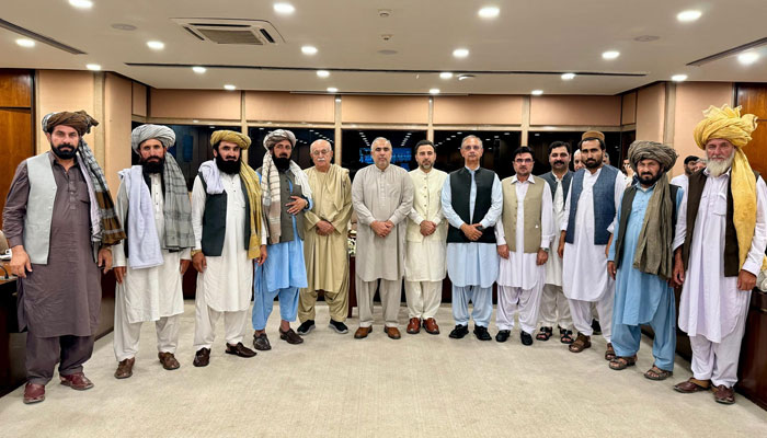 NA Leader of Opposition Omar Ayub Khan, ex-speaker NA Asad Qaiser,  PkMAP Chairman Mehmood Khan Achakzai and others pose for a group photo on May 27, 2024. — Facebook/Omar Ayub Khan