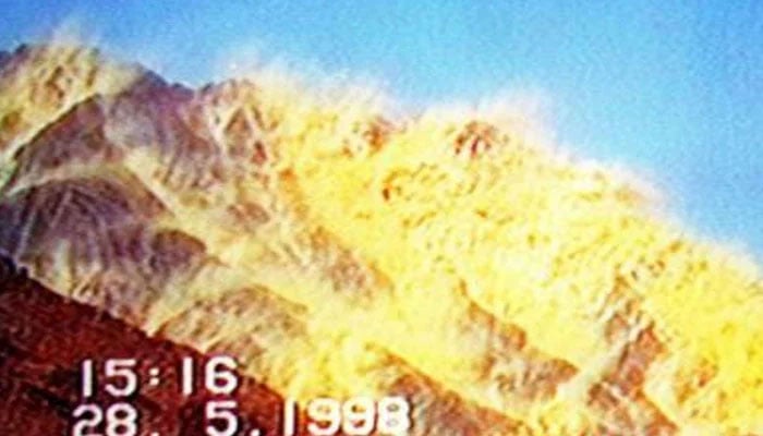 Dust rises from Chaghi mountains after Pakistan conducted its nuclear tests on May 28, 1998. — Radio Pakistan