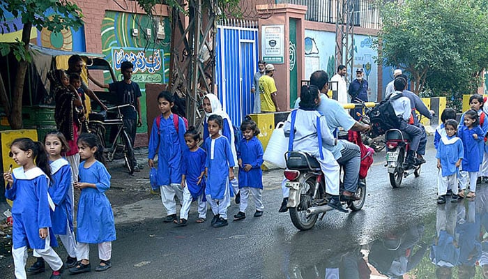 A representational image of students going to school in this undated image. — APP/File