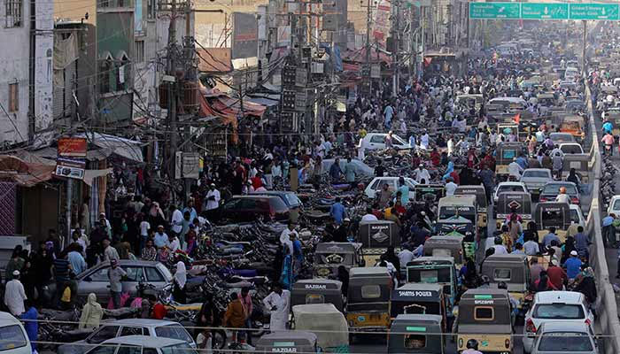 A representational image of a crowded street at a commercial area in Karachi.— The News/file