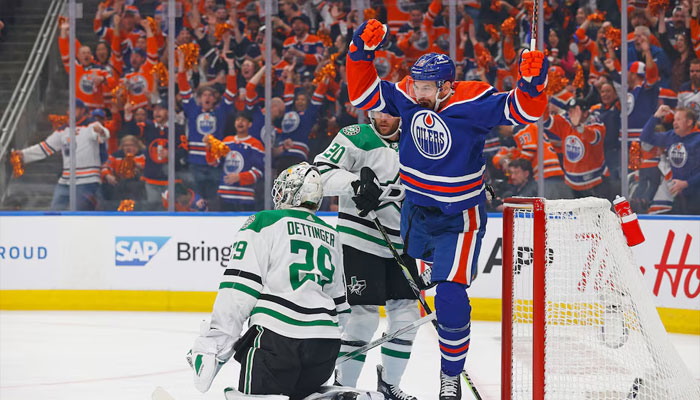 Edmonton Oilers forward Zach Hyman (18) celebrates after scoring a goal against the Dallas Stars in game three of the Western Conference Final of the 2024 Stanley Cup Playoffs at Rogers Place. — USA Today Sports