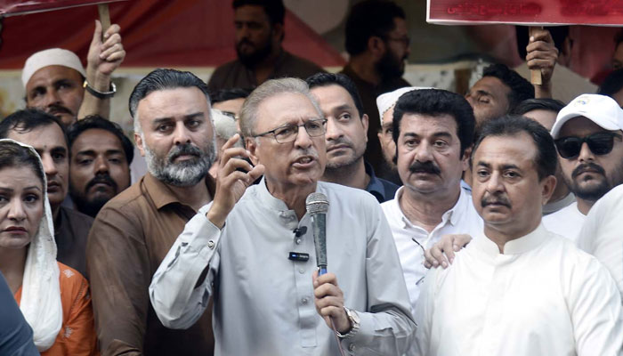 Former president and PTI leader Dr Arif Alvi addresses protesters during a demonstration ofor the release of PTI founder Imran Khan, at Karachi press club on May 28, 2024. — PPI